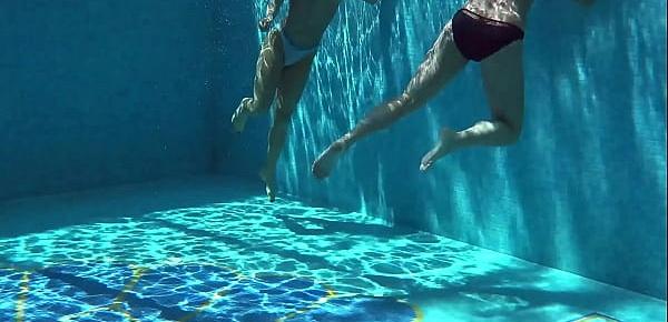  Jessica and Lindsay swim naked in the pool